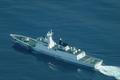 FILE PHOTO: An aerial view of a China Coast Guard ship navigating near the disputed Scarborough Shoal, as Philippine Coast Guard aircraft carrying journalists patrols the area