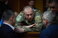 Commander in Chief of the Ukrainian Armed Forces Colonel General Syrskyi speaks with lawmakers during a parliament session in Kyiv