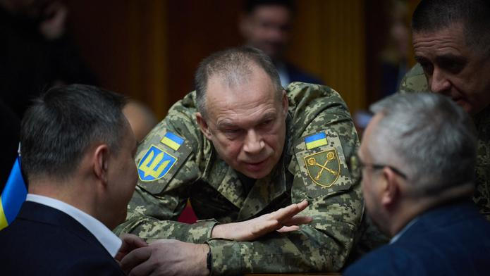Commander in Chief of the Ukrainian Armed Forces Colonel General Syrskyi speaks with lawmakers during a parliament session in Kyiv