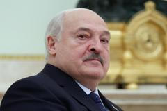 FILE PHOTO: Belarusian President Lukashenko attends a meeting with Russian President Putin in Moscow