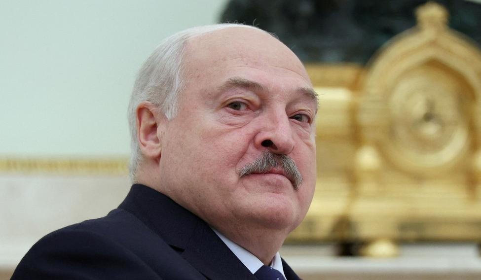 FILE PHOTO: Belarusian President Lukashenko attends a meeting with Russian President Putin in Moscow