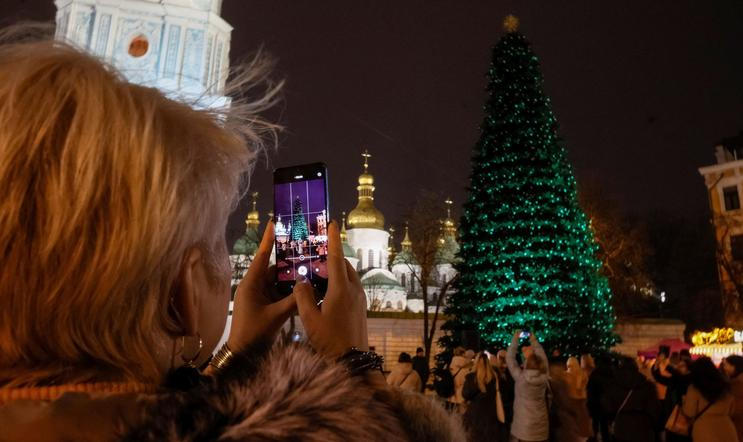 Ukraine's main Christmas tree is illuminated in Kyiv