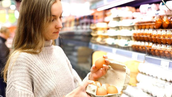 Woman,Chooses,Chicken,Eggs,In,A,Farm,Food,Store.,Food