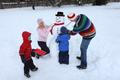 Family making a snowman