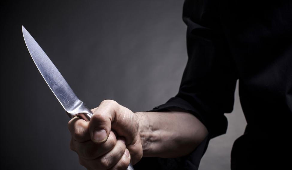 Nůž a ruka, ilustrační foto