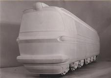 Po Františku Kardausovi se návrhářského pera ujal architekt Otakar Diblík, který zcela přepracoval čelní partie.