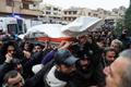 Funeral of several people who were killed in an explosion at a mosque of the Alawite minority sect yesterday, Syrian state news agency SANA said, in Homs