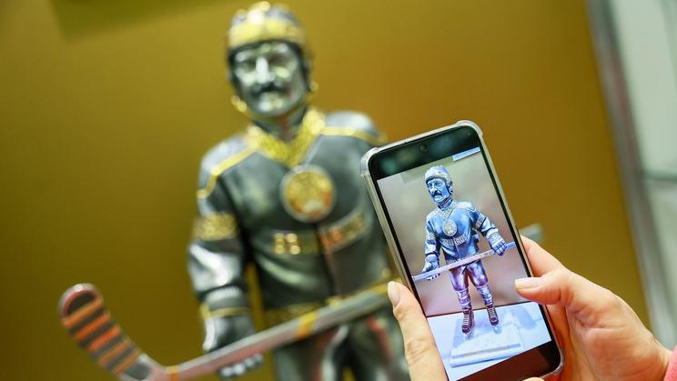 Běloruský vůdce Alexandr Lukašenko zpodobněný jak hokejista