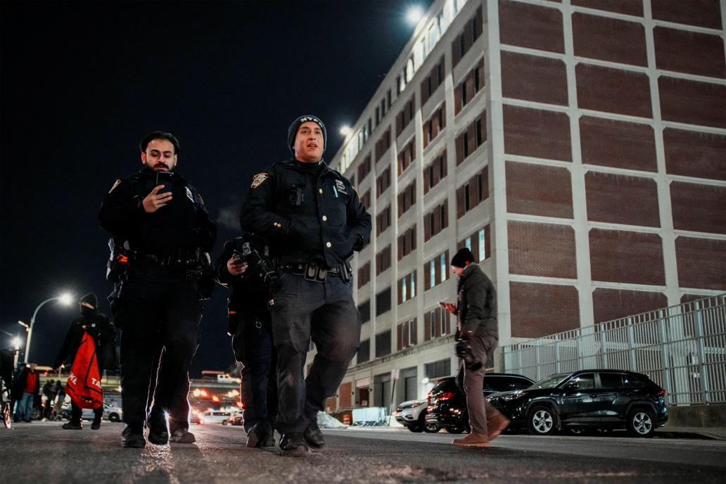 NYPD officers patrol outside of the Metropolitan Detention Center in Brooklyn , New York
