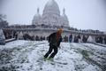 Snow and freezing temperatures hit Paris