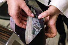 FILE PHOTO: Illustration shows Russian rouble banknotes