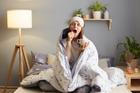 Indoor,Shot,Of,Sleepy,Woman,Wrapped,In,A,Blanket,After
