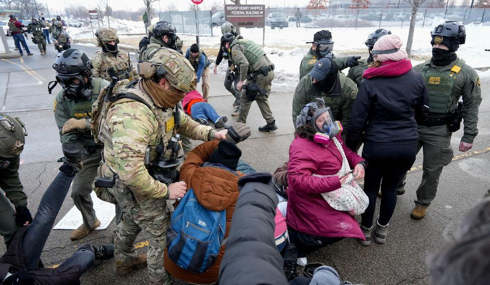 People protest against the fatal shooting of Renee Nicole Good by an ICE agent, in Minneapolis