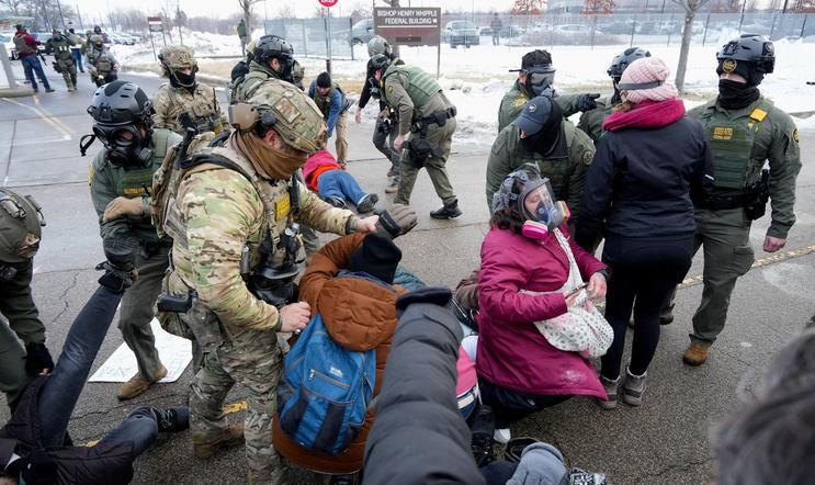 People protest against the fatal shooting of Renee Nicole Good by an ICE agent, in Minneapolis