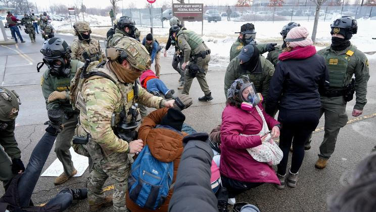 People protest against the fatal shooting of Renee Nicole Good by an ICE agent, in Minneapolis