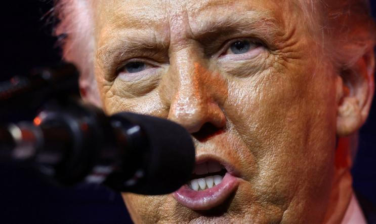 FILE PHOTO: U.S. President Donald Trump addresses House Republicans at the Kennedy Center in Washington