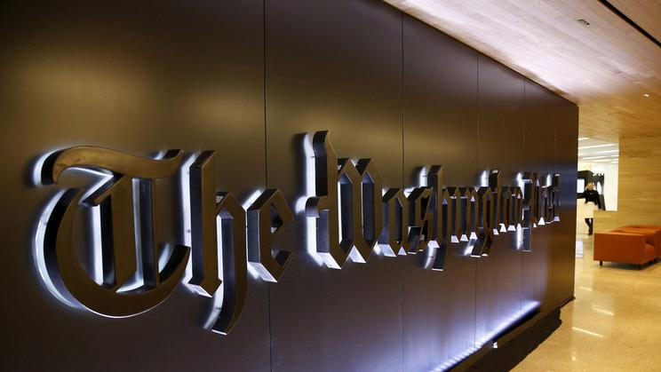 FILE PHOTO: Newspaper banner logo is seen during grand opening of Washington Post in Washington