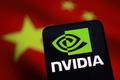 FILE PHOTO: Illustration shows Nvidia logo and Chinese flag
