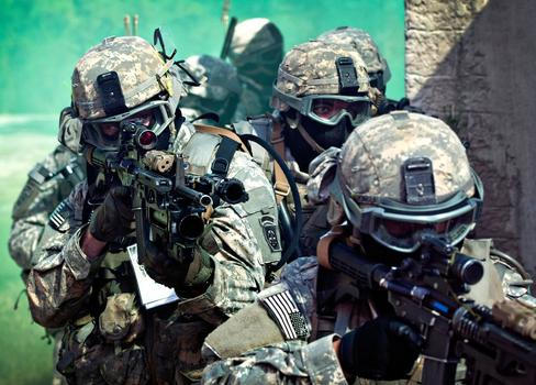U.S. Army paratroopers assigned to the 1st Battalion, 508th Parachute Infantry Regiment, 82nd Airborne Division prepare to enter a building as they conduct close-quarters combat training during an air assault mission September 26, 2013 at Fort Bragg, NC.