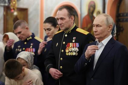 Russia's President Putin attends Orthodox Christmas liturgy