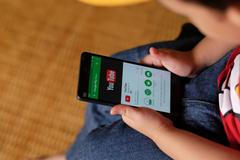 Kuala,Lumpur,,Malaysia,-,14,Feb,:,Kid,Watching,Youtube