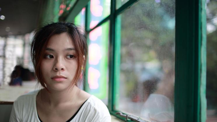 Smutná žena, Čína, Číňanka - ilustrační foto.