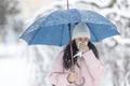 Woman,Holds,Umbrella,While,Clearing,Her,Nose,Due,To,Winter