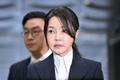 FILE PHOTO: South Korea's former first lady Kim Keon Hee arrives at a court to attend a hearing to review her arrest warrant, in Seoul