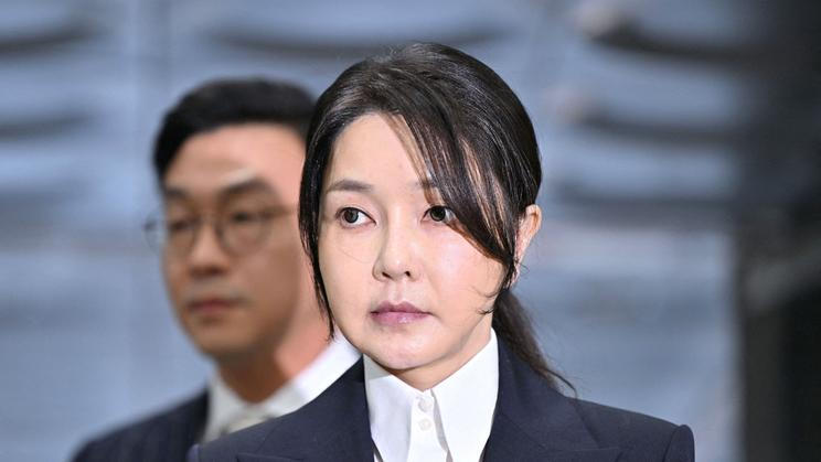 FILE PHOTO: South Korea's former first lady Kim Keon Hee arrives at a court to attend a hearing to review her arrest warrant, in Seoul