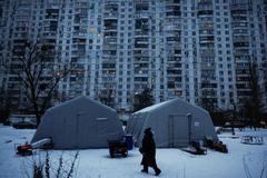 Kyiv residents cope with cold after heating loss as critical civil infrastructure was hit by recent Russian missile and drone strikes