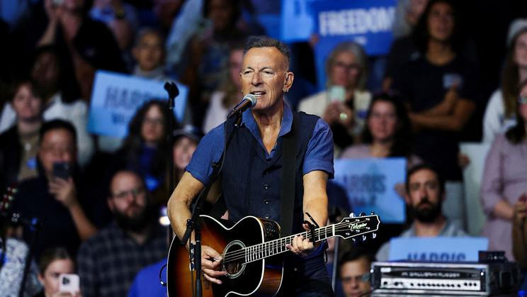 FILE PHOTO: Former U.S. President Barack Obama and rock star Bruce Springsteen campaign for Kamala Harris and Tim Walz in Philadelphia