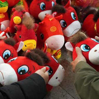 Horse plush toys ahead of the Chinese Lunar New Year in Yiwu