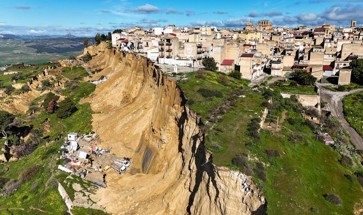 Landslide leaves Sicilian town off cliff edge after bad weather 