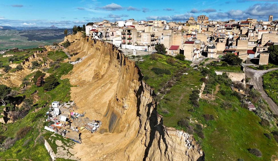Landslide leaves Sicilian town off cliff edge after bad weather 