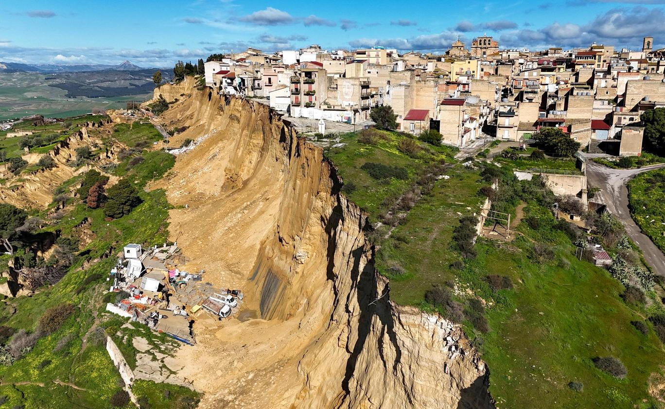 Landslide leaves Sicilian town off cliff edge after bad weather 