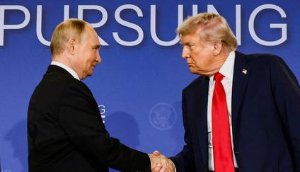 FILE PHOTO: U.S. President Trump meets with Russian President Putin in Alaska