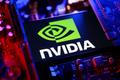 FILE PHOTO: Illustration shows NVIDIA logo and computer motherboard