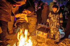 Kyjev sevřený ledem, teplárna leží v troskách