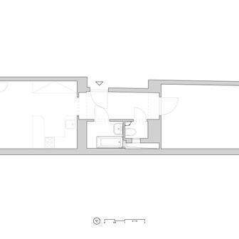 Nejvýraznější krok celé rekonstrukce? Rozhodnutí změnit dispozici bytu – a to bez jediného bourání příček. Architekti si uvědomili, že původní rozložení místností nevyužívá potenciál světla ani klidu, které byt nabízí.