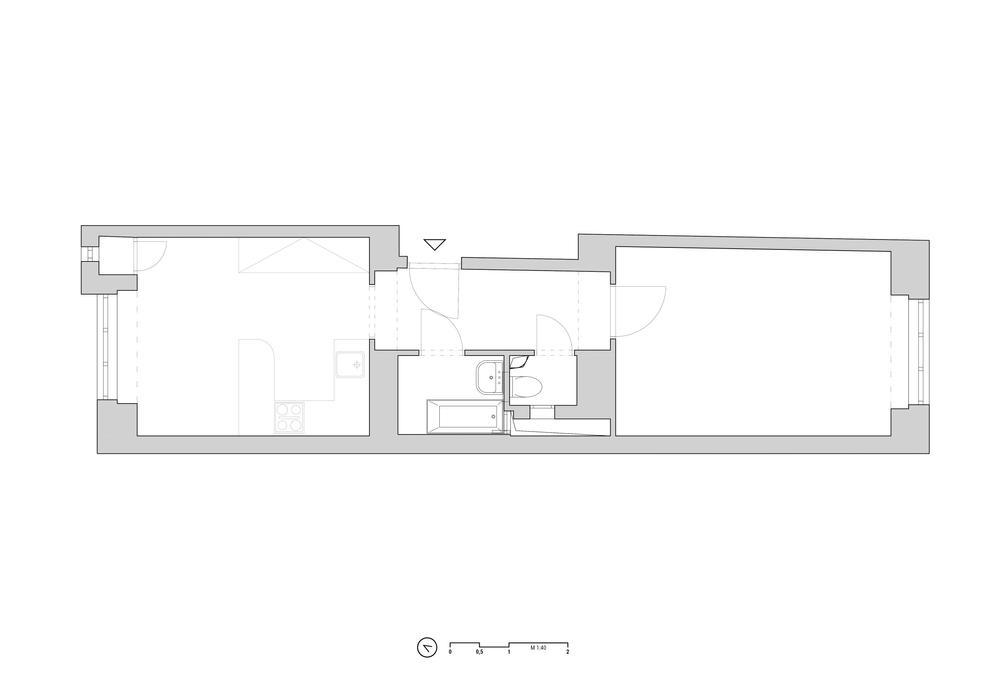 Nejvýraznější krok celé rekonstrukce? Rozhodnutí změnit dispozici bytu – a to bez jediného bourání příček. Architekti si uvědomili, že původní rozložení místností nevyužívá potenciál světla ani klidu, které byt nabízí.