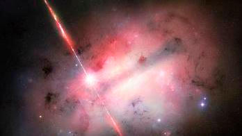 NASA zveřejnila koncept výbuchu GRB 250702B (vlevo od středu) uvnitř jeho hostitelské galaxie.