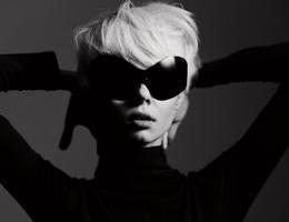 Stylish,Woman,With,Short,White,Hair,Posing,Dramatically,In,Black