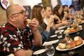 Doughnut speed eating competition marks Fat Thursday