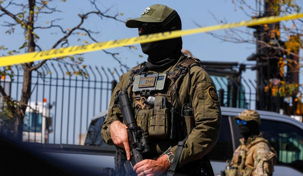 FILE PHOTO: People protest during a standoff with ICE and federal officers in Chicago