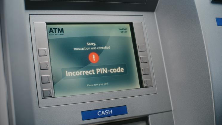 Atm,User,Entering,Pin,Code,On,Atm,Keypad,For,Money