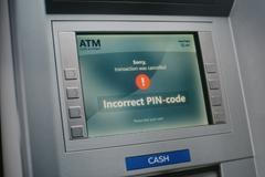 Atm,User,Entering,Pin,Code,On,Atm,Keypad,For,Money