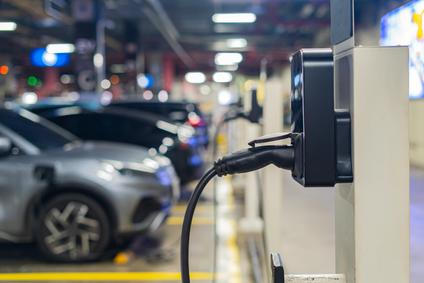 Electric,Cars,Are,Being,Charged,At,Electric,Vehicle,Charging,Stations.