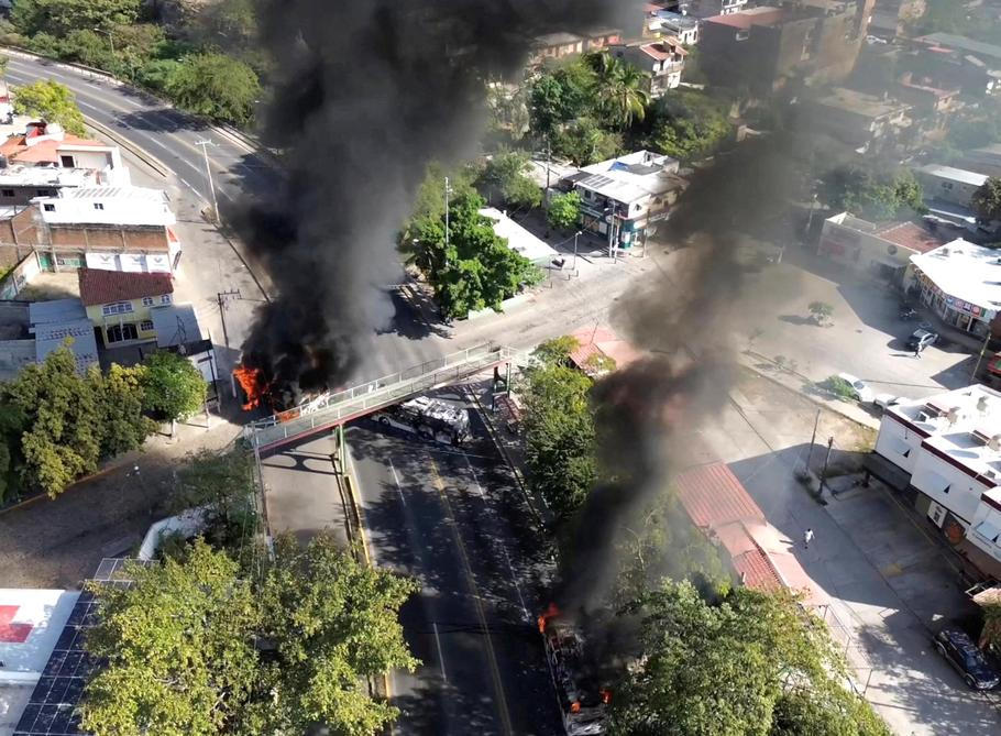 Smoke billows, following a military operation in which a government source said Mexican drug lord Nemesio Oseguera, known as "El Mencho," was killed, in Puerto Vallarta