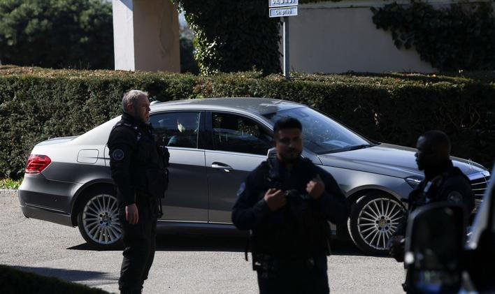 A diplomatic car carrying an Iranian delegation drives near the residence of the Omani ambassador to the United Nations, in Cologny