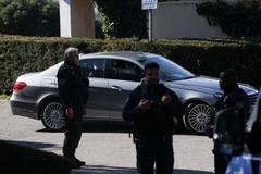 A diplomatic car carrying an Iranian delegation drives near the residence of the Omani ambassador to the United Nations, in Cologny